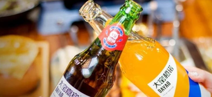 吴京代言的国产汽水，还是“卖身”给了美国